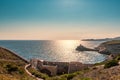 Evening sun on lighthouse at entrance to Bonifacio port