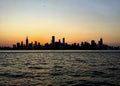 Evening sunset over Chicago silhouettes the skyline, as seen from Lake Michigan Royalty Free Stock Photo