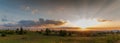 Evening sunset over the mountains in spring. Panorama, panoramic Royalty Free Stock Photo