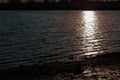 An evening sunset reflects in the water creating a wonderful sight