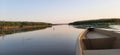 Evening sunset on the river. The Volga river. Fishing. Speedboat passage