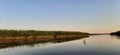 Evening sunset on the river. The Volga river. Fishing. Peals. Reeds.