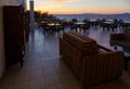 evening sunset on terrace bar of the resort, the beautiful sky and sea , Europe, Greece Royalty Free Stock Photo