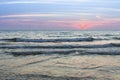Evening surf of the sea during sunset. Nature. Royalty Free Stock Photo
