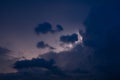 Evening thunderstorm with lightning in the mountains. Dramatic clouds during a thunderstorm pierce the light of Royalty Free Stock Photo