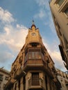 Evening in the town center of Sitges, tower with clock on modernist building