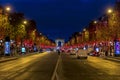 Evening traffic on Champs-Elysees in front of Arc de Triomphe Paris, France at Christmas Time Royalty Free Stock Photo