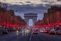 Evening traffic on Champs-Elysees in front of Arc de Triomphe Paris, France at Christmas Time Royalty Free Stock Photo