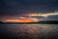 Evening trip. Summer sunset above the lake.