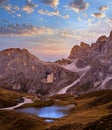 Evening twilight autumn alpine Dolomites mountain scene, Trento, Italy. Lake or Laghetto Baita Segantini view