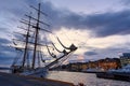 In the evening and twilight beautiful sky with a large sailboat moored at the yacht harbor in Oslo Royalty Free Stock Photo