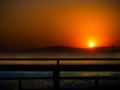 Evening Twilight Gold with Fog and Silhouette Wooden Balcony