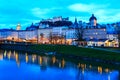 Evening twilight view of Salzburg across Salzach river in Austria Royalty Free Stock Photo