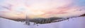 Evening twilight winter calm mountain panorama with sheds group and mount ridge behind (Carpathian Mountains, Ukraine Royalty Free Stock Photo