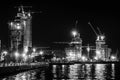 Evening view of Baku. Illuminated skyline of Baku, Azerbaijan at night with lights of buildings reflected in the water. Skyscraper Royalty Free Stock Photo