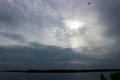 Evening view of clouds and sun above the Seliger lake, Russia Royalty Free Stock Photo