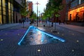 Evening view - a fountain and tall modern houses on boulevard in city Beautiful autumn cityscape at night