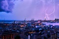 Evening view of Genoa port with thunderstorm and lighting, Italy Royalty Free Stock Photo