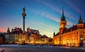 Evening view of the historic center of Warsaw. Panoramic view on Royal Castle, ancient townhouses and Sigismund`s Column in Old Royalty Free Stock Photo