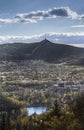 Evening view of illuminated Liberec city and Jested Mountain