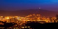 Evening view of illuminated Liberec city and Jested Mountain. Night scene Royalty Free Stock Photo