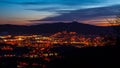 Evening view of illuminated Liberec city and Jested Mountain. Night scene Royalty Free Stock Photo