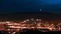 Evening view of illuminated Liberec city and Jested Mountain. Night scene Royalty Free Stock Photo