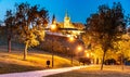 Evening view of illuminated Prague Castle, Prazsky Hrad, from Petrin Gardens, Prague. Czech Republic