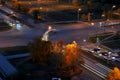 Evening view of the intersection of Frunze and Yubileinaya streets and cars standing at a traffic light.