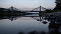 Evening view of the Loschwitz Bridge in Germany over river Elbe with moon in the sky