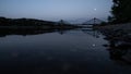 Evening view of the Loschwitz Bridge in Germany over river Elbe with moon in the sky