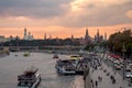 Moscow - September 24, 2018. Evening view of the Moscow Kremlin, Zaryadye park and ships on Moscow river in front of rainy clouds Royalty Free Stock Photo