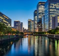 Evening view of Osaka downtown business area Okawa river