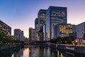 Evening view of Osaka downtown business area Okawa river