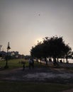 Evening view of a picnic spot near a lake inside a town adding its sweet scent and beauty to the surrounding