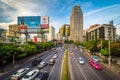 Evening view of Ratchadapisek Road and skyscrapers at Sukhumvit, in Bangkok, Thailand.