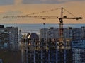 Evening view of a residential house under construction and the Volga Region Orthodox Institute in the background Royalty Free Stock Photo