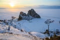Evening view of Shaman rock one of sacred place in frozen lake Baikal in winter season of Siberia, Russia. Royalty Free Stock Photo