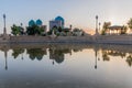 Evening view of a small pond and Dorut Tilavat complex with Kok Gumbaz mosque in Shahrisabz, Uzbekist