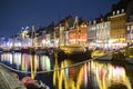 Evening view to boats in front of colourful old houses at Nyhavn harbour canal in Copenhagen, Denmark. February 2020 Royalty Free Stock Photo