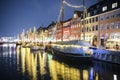 Evening view to boats in front of colourful old houses at Nyhavn harbour canal in Copenhagen, Denmark. February 2020 Royalty Free Stock Photo