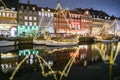 Evening view to boats in front of colourful old houses at Nyhavn harbour canal in Copenhagen, Denmark. February 2020 Royalty Free Stock Photo