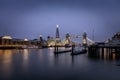 Evening view to the skyline of London with Tower Bridge and illuminated buildings Royalty Free Stock Photo