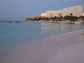 Evening view to white hotels buildings on sandy beach at bay of Caribbean Sea in Cancun city in Mexico Royalty Free Stock Photo