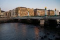 Evening walk along river in central part of Donostia or San Sebastian city, Basque Country, Spain