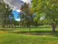 Evening walk at the park enjoying the warm summer temperature Royalty Free Stock Photo