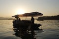 Evening by the West Lake sunset boat scene