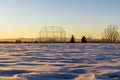 Evening winter Coloradan landscape with baseball backstop