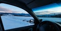 Evening winter mountain ridge view through car windshield Royalty Free Stock Photo