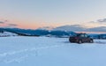 Evening winter mountain ridge view thru car windshield Royalty Free Stock Photo